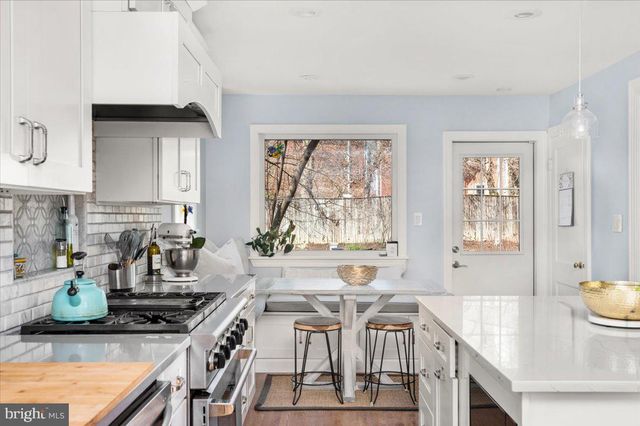 a bedroom with a bed and a view of bedroom