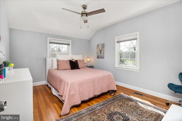 a view of a hallway with staircase