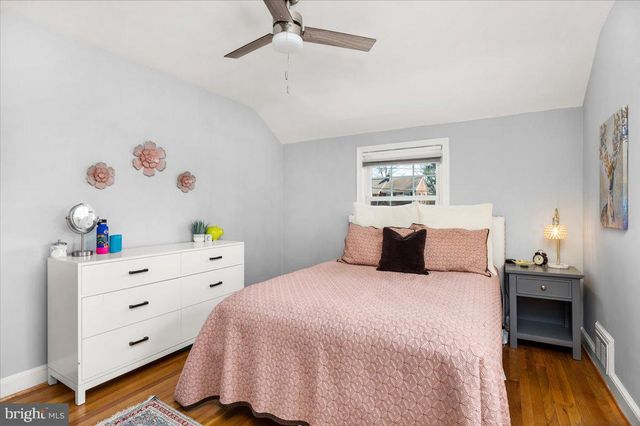 a living room with closet and a window