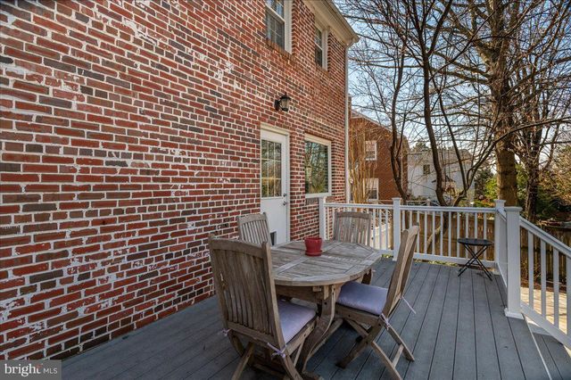 a view of a car park in front of house