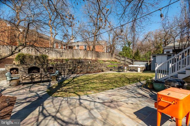 a view of a house with sitting area and furniture