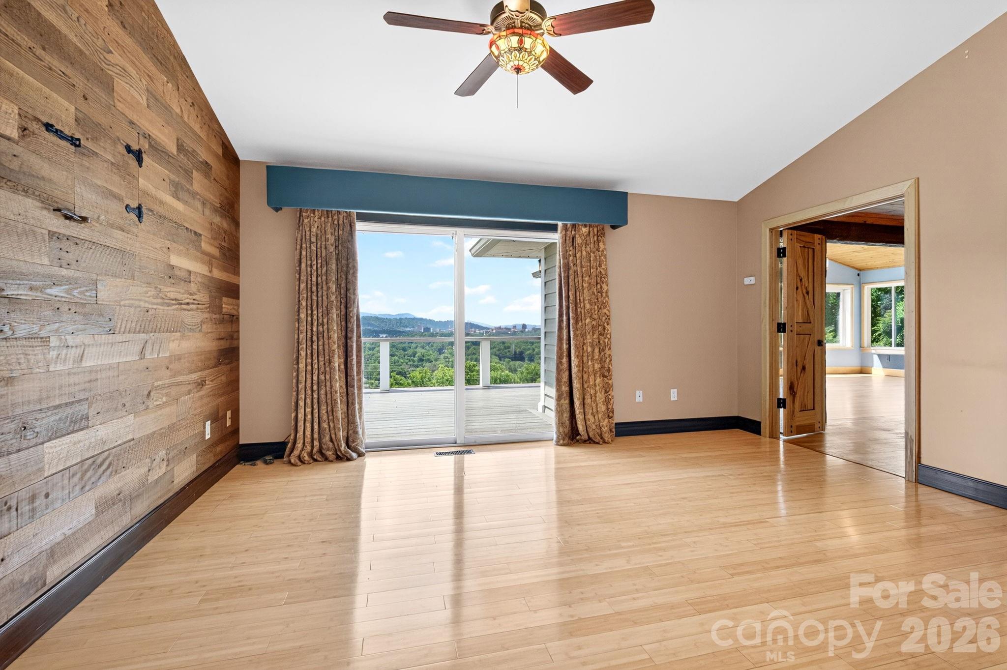 38 Lookout Road Asheville, NC 28804 - Photo 20 of 34 a view of an empty room with a window