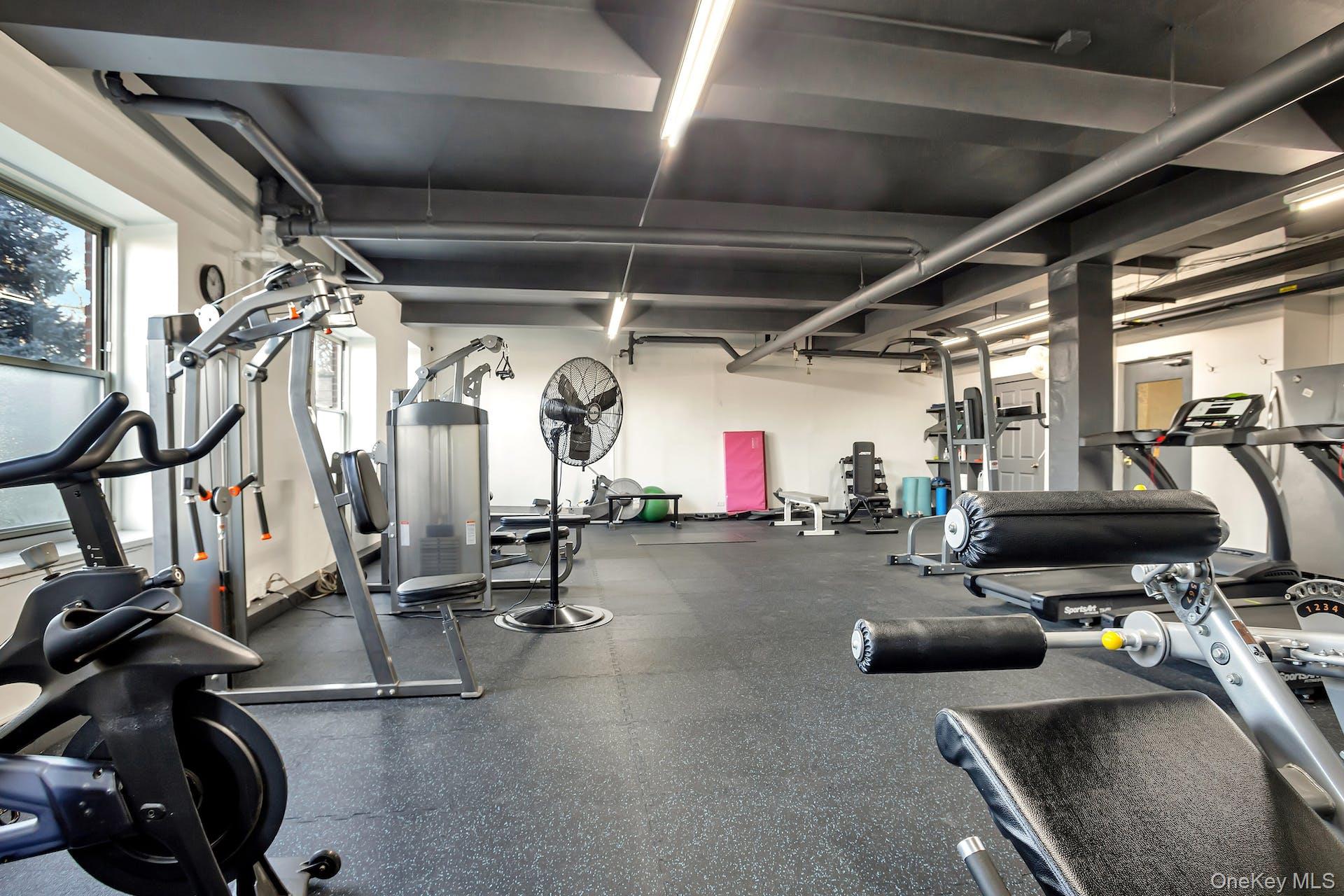 113-14 72nd Road, Unit 3D Queens, NY 11375 - Photo 17 of 22 a view of a room with gym equipment