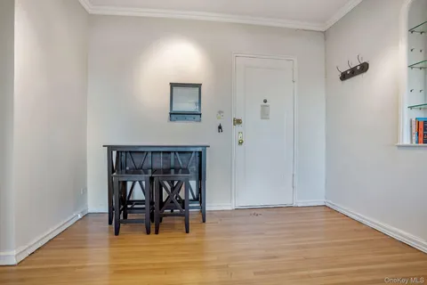 a view of a livingroom with furniture and wooden floor