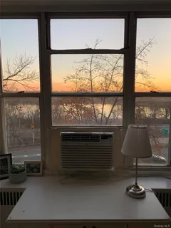 a room with furniture and window