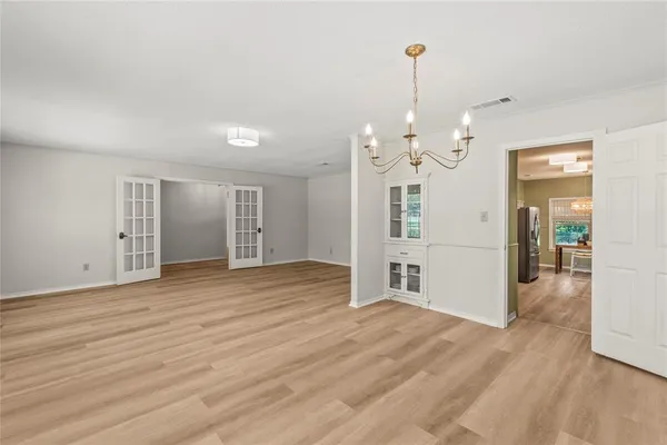 a view of a livingroom with wooden floor