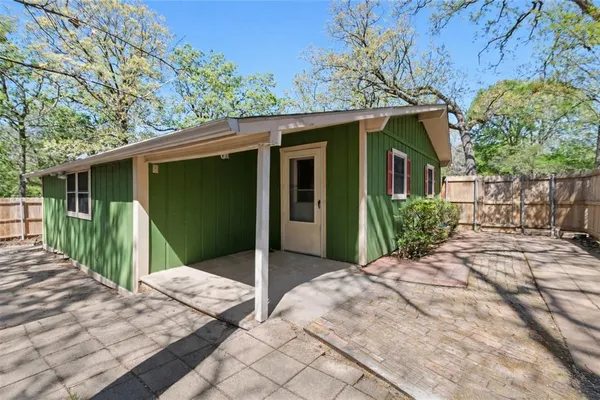 a view of a house with a porch