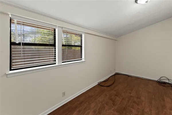 a view of a room that has a window in it