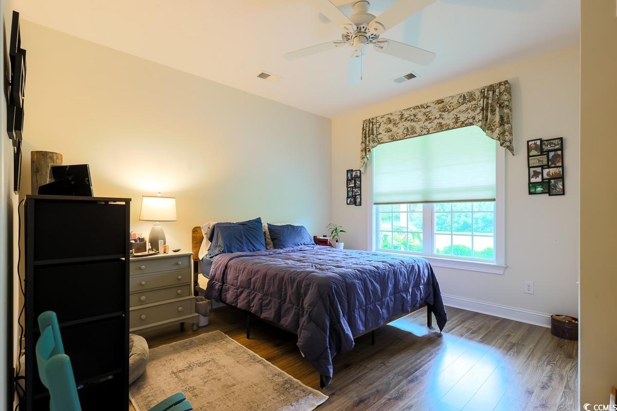5900 Pope Martin Road Conway, SC 29527 - Photo 17 of 31 Bedroom with wood finished floors and ceiling fan