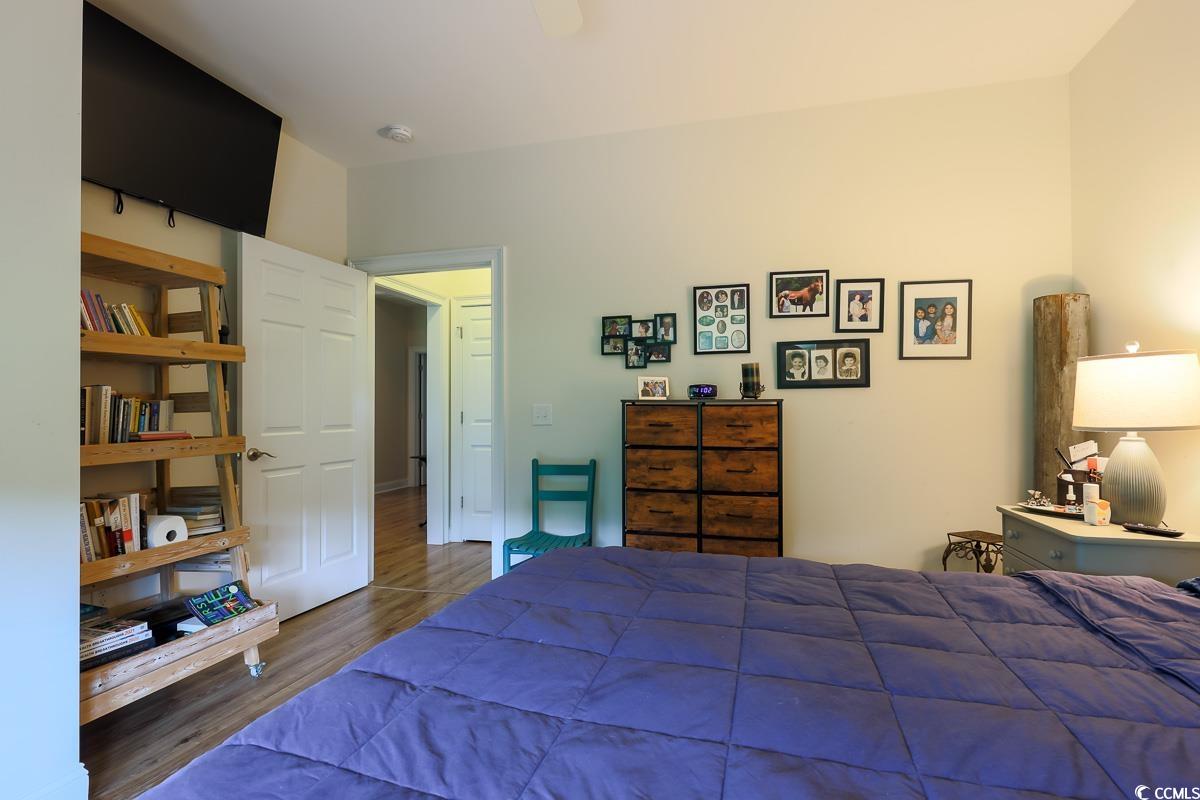 5900 Pope Martin Road Conway, SC 29527 - Photo 18 of 31 Bedroom with wood finished floors