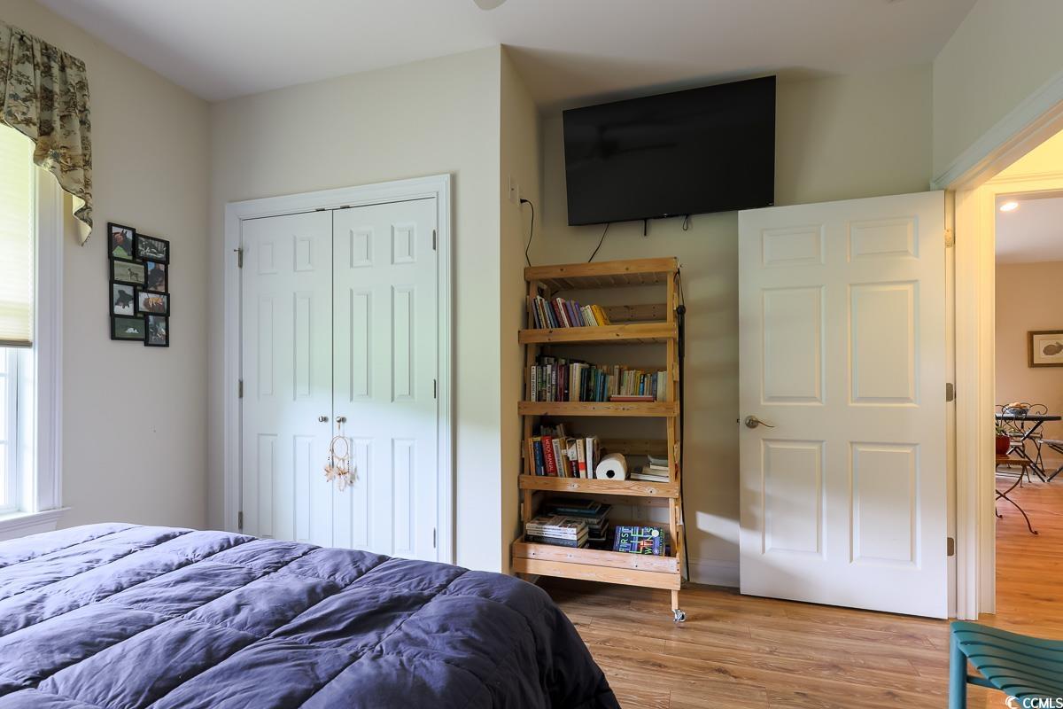 5900 Pope Martin Road Conway, SC 29527 - Photo 19 of 31 Bedroom with wood finished floors and a closet
