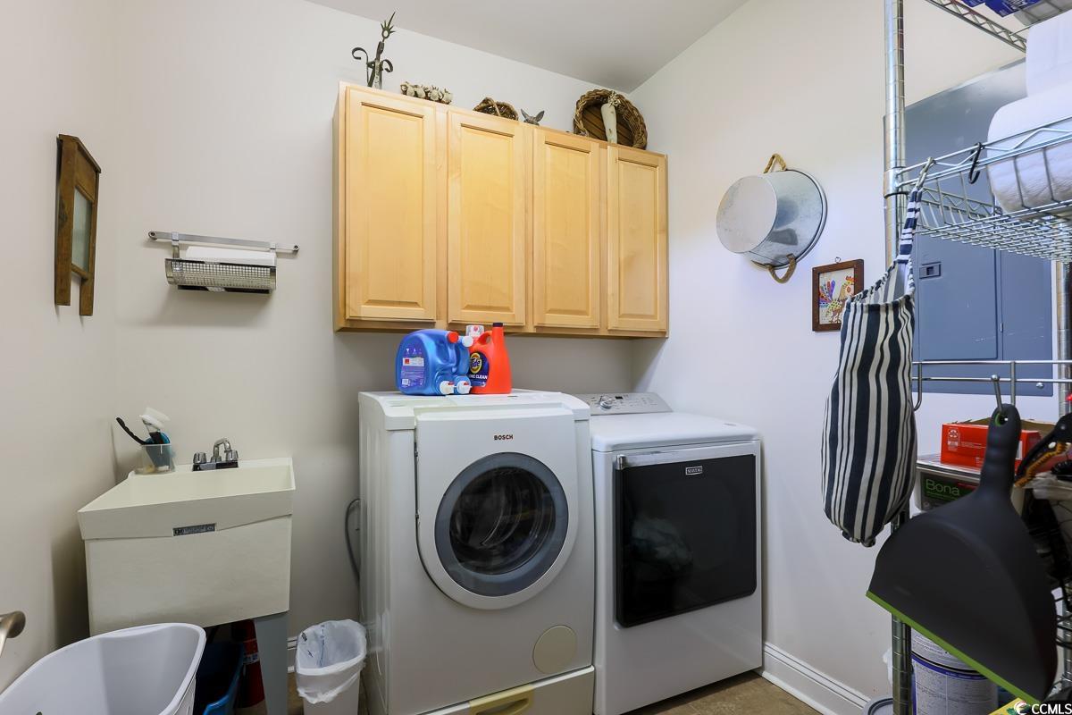 5900 Pope Martin Road Conway, SC 29527 - Photo 21 of 31 Laundry area with cabinet space and washing machine and dryer