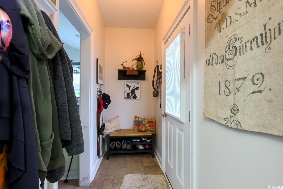 5900 Pope Martin Road Conway, SC 29527 - Photo 22 of 31 Mudroom featuring healthy amount of natural light and light tile patterned flooring