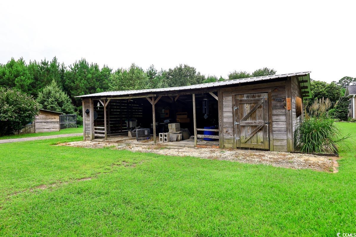 5900 Pope Martin Road Conway, SC 29527 - Photo 27 of 31 View of pole building with a lawn
