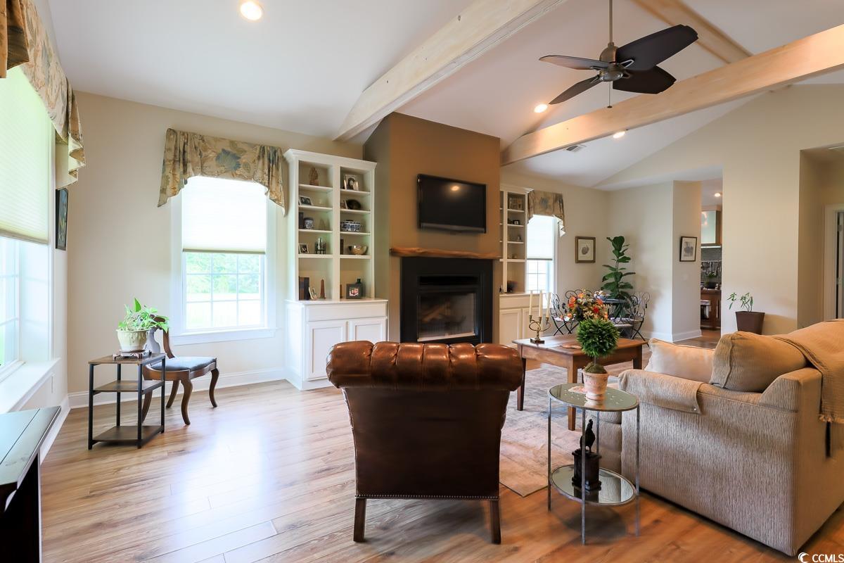 5900 Pope Martin Road Conway, SC 29527 - Photo 4 of 31 Living room with wood finished floors, a fireplace, plenty of natural light, a ceiling fan, and recessed lighting