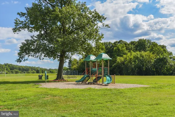a view of a park with swings