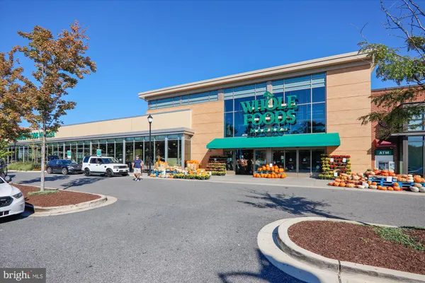 a view of a cafe with sitting area