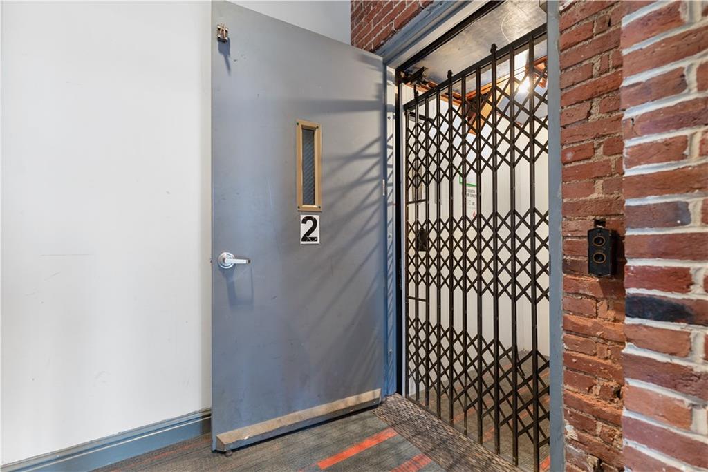 3501 Butler Street, Unit 2A Pittsburgh, PA 15201 - Photo 17 of 22 Elevator to parking at the back of building