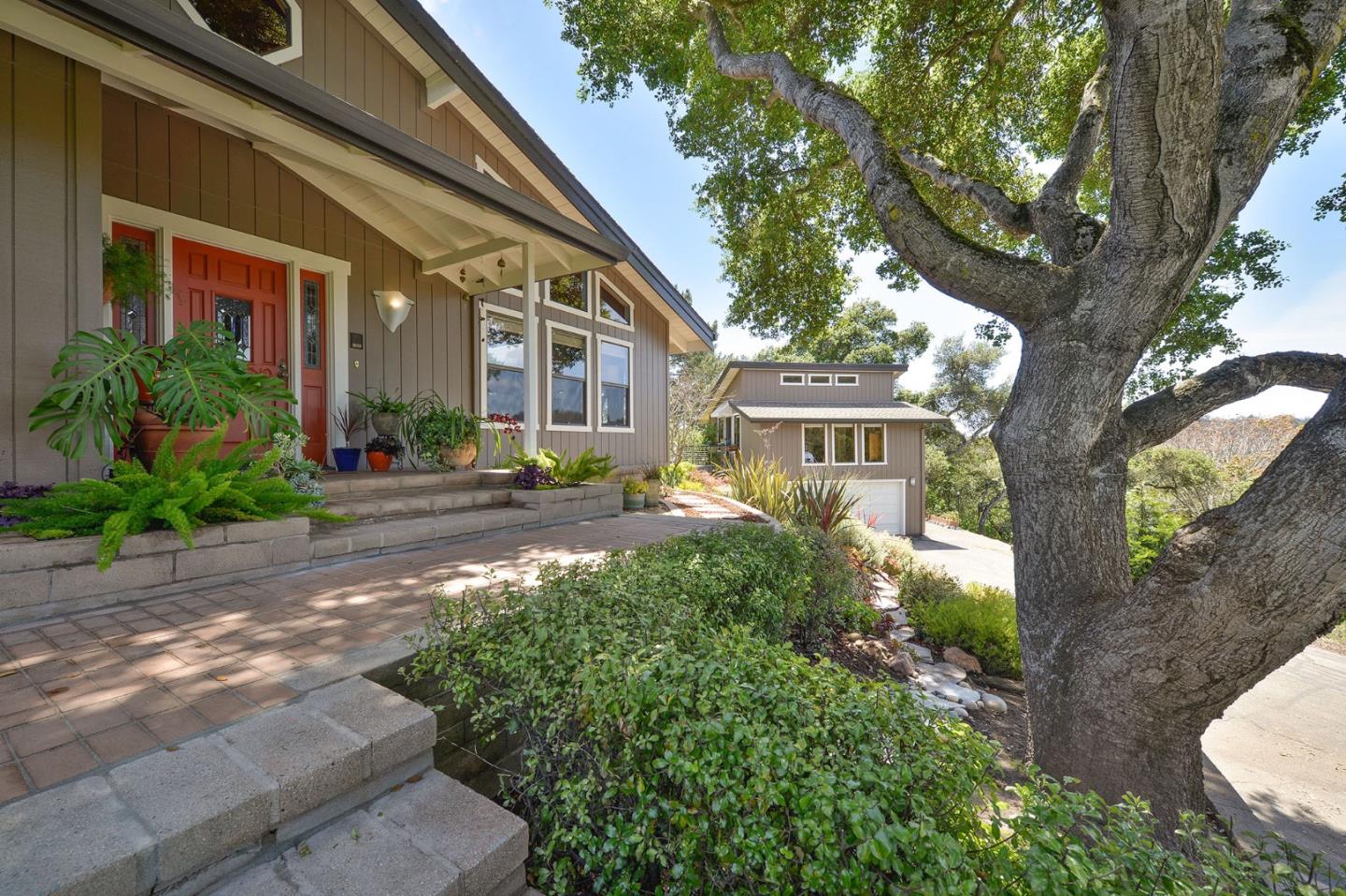 1616 Chardonnay Ridge Road Aptos, CA 95003 - Photo 5 of 43 a front view of a house with garden