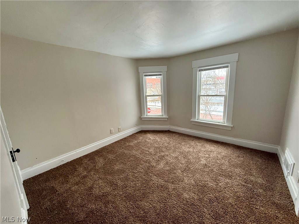 39 North Balch Street Akron, OH 44303 - Photo 6 of 19 Carpeted empty room with baseboards
