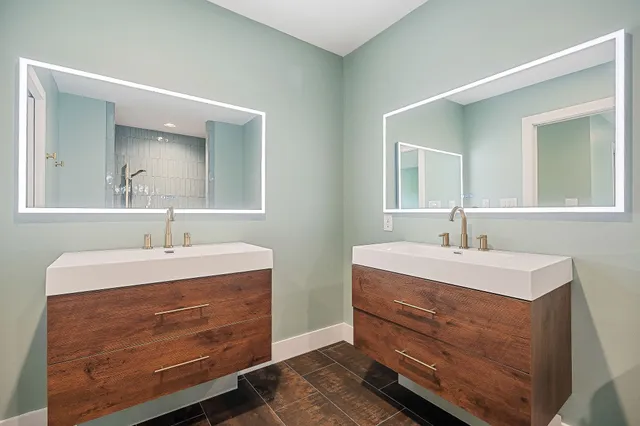 a view of a livingroom with furniture and a window