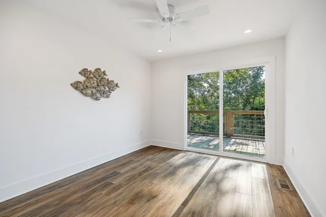 a view of a house with large windows