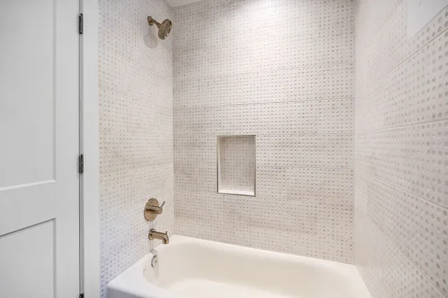 a view of a balcony with wooden floor