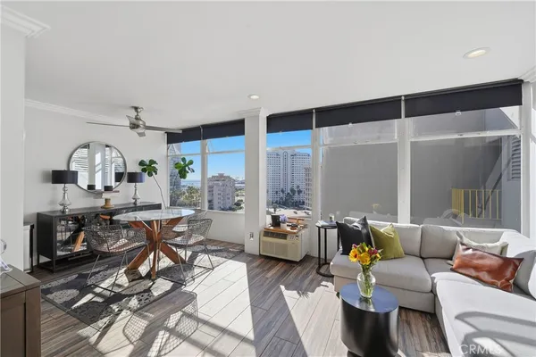 a living room with furniture and a window