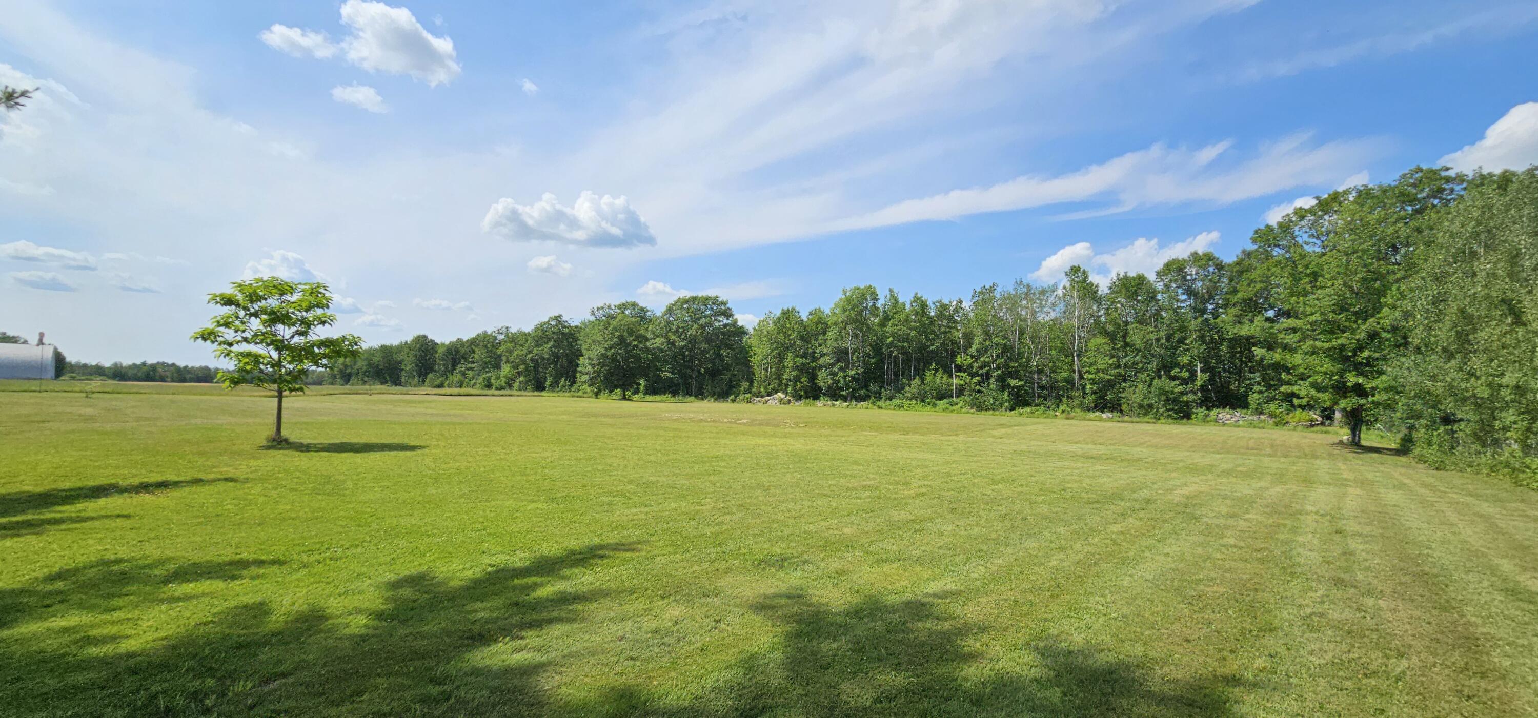 292 Neck Road Benton, ME 04901 - Photo 4 of 39 04.Backyard