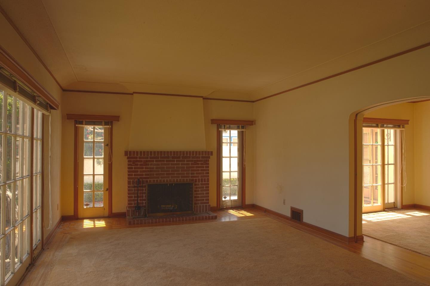 160 Lorimer Street Salinas, CA 93901 - Photo 2 of 13 a view of empty room with window and fireplace