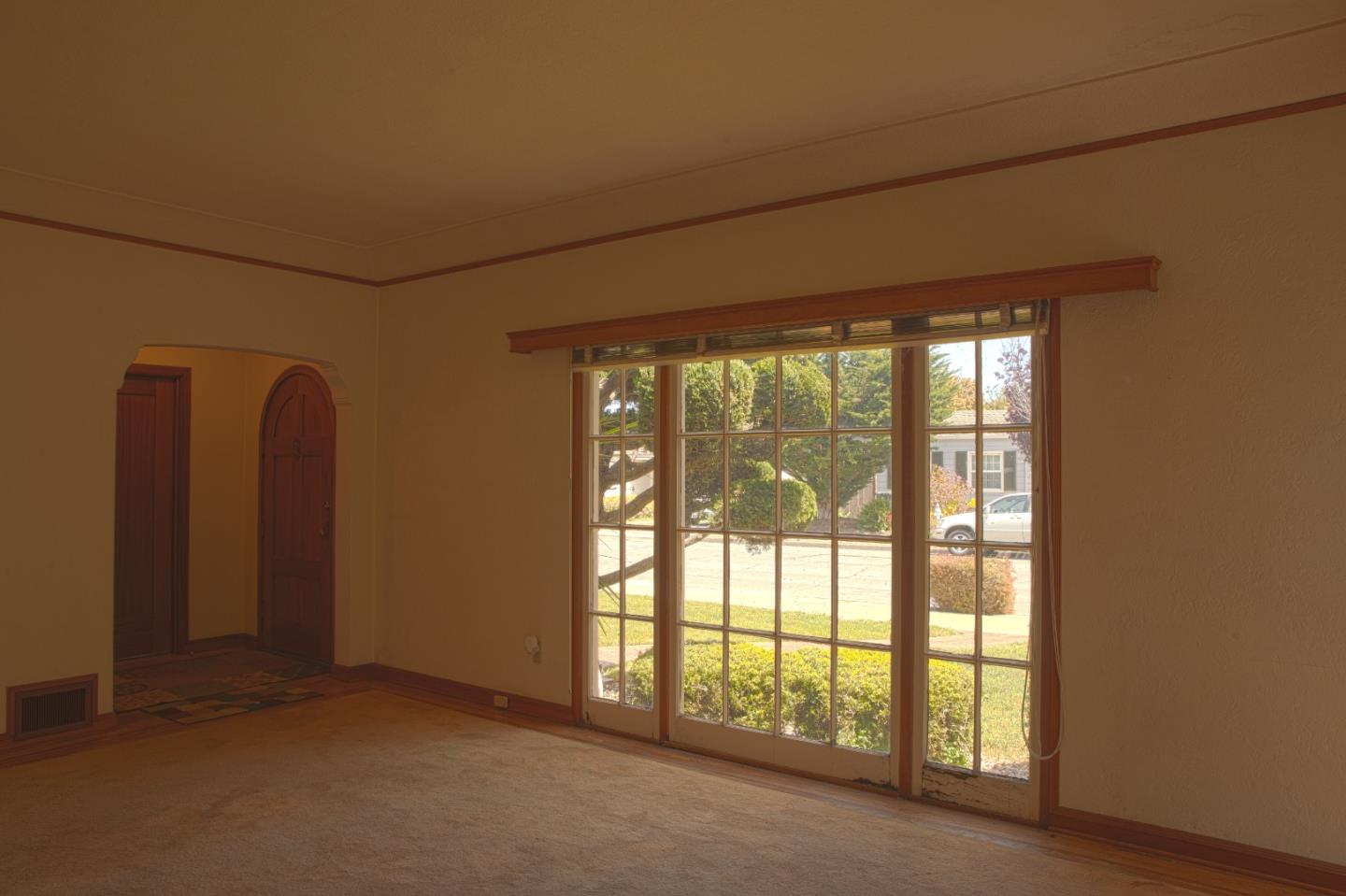 160 Lorimer Street Salinas, CA 93901 - Photo 4 of 13 a view of empty room with floor to ceiling window