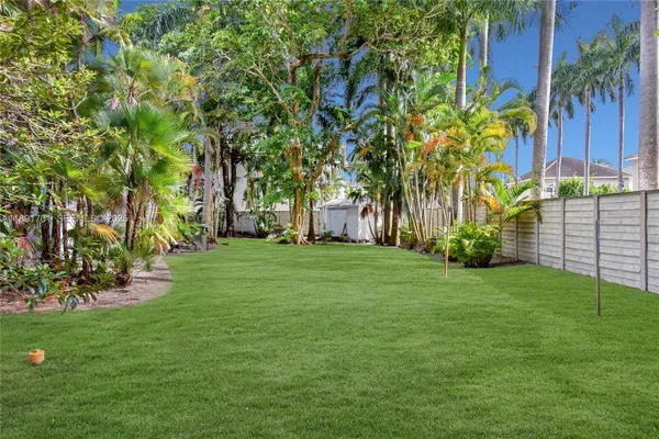 a view of a backyard with a garden