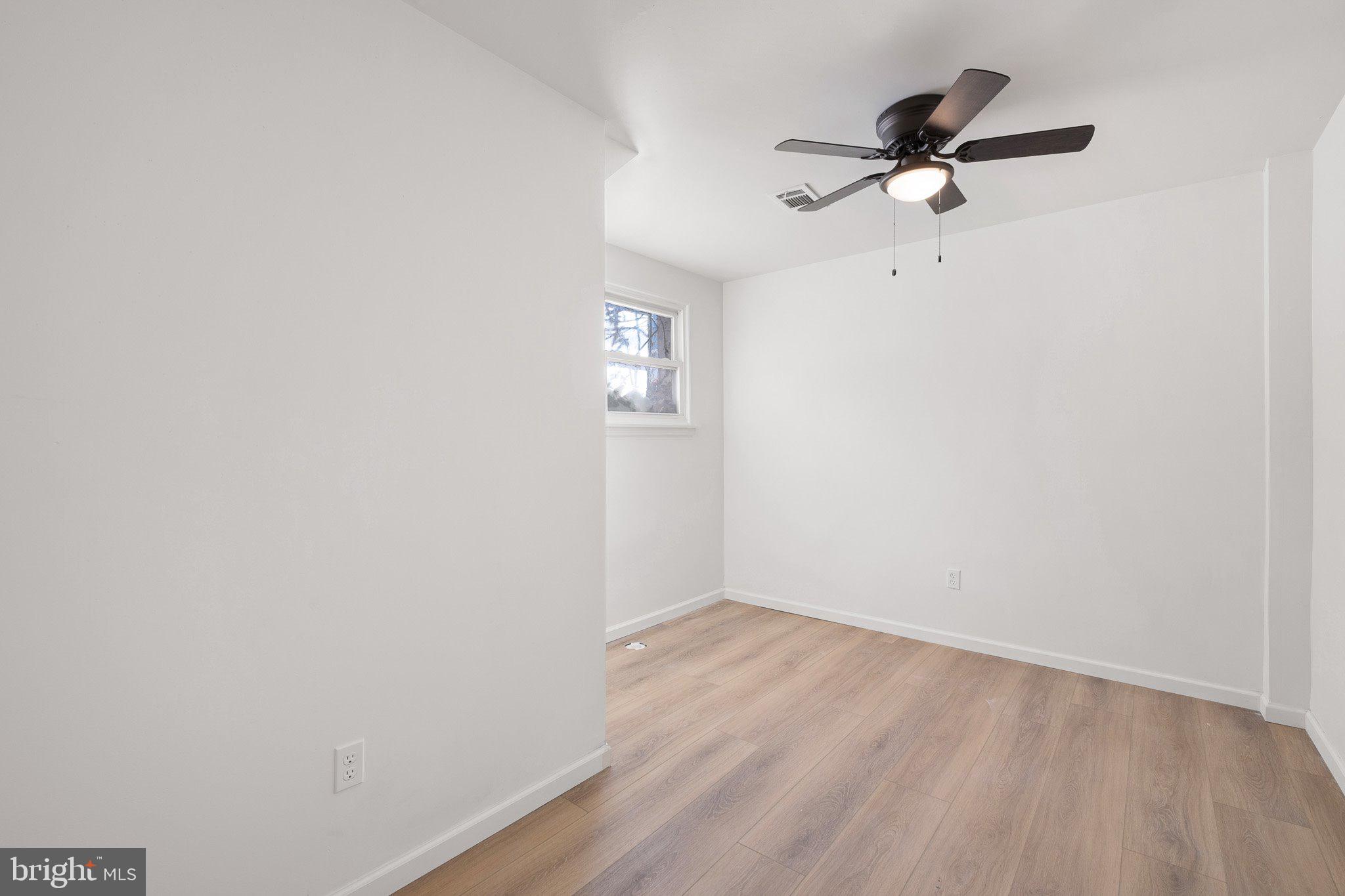 255 Prospect Avenue, Unit B Downingtown, PA 19335 - Photo 13 of 20 a view of a room with a hanging light