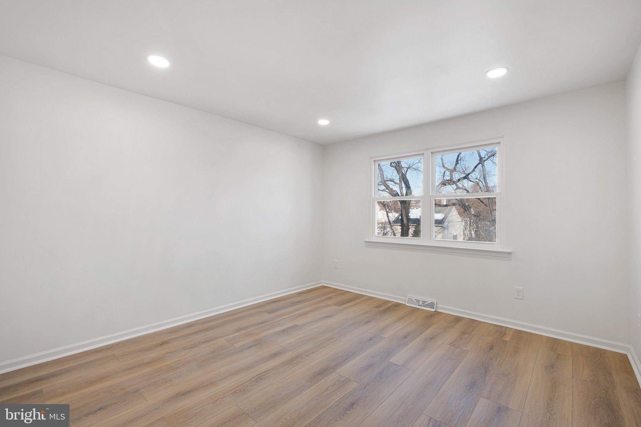 255 Prospect Avenue, Unit B Downingtown, PA 19335 - Photo 17 of 20 a view of a room with wooden floor and window