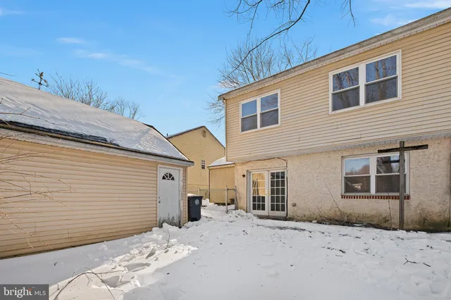 a view of a house with a snow