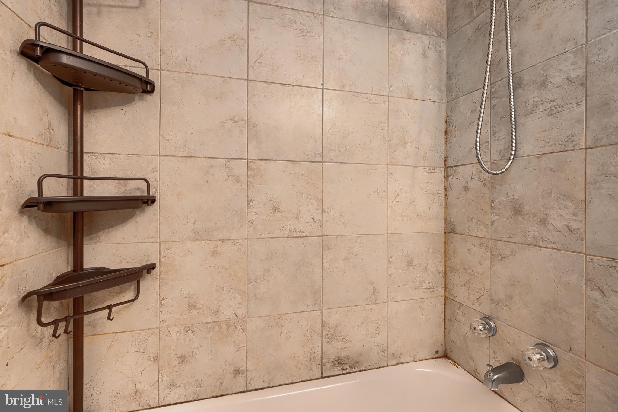 9706 Liberty Road Randallstown, MD 21133 - Photo 32 of 43 a bathroom with a shower