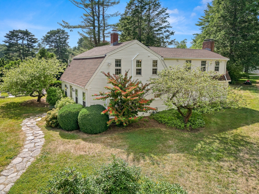 864 Bay Road Hamilton, MA 01982 - Photo 1 of 42 a view of a house with a yard