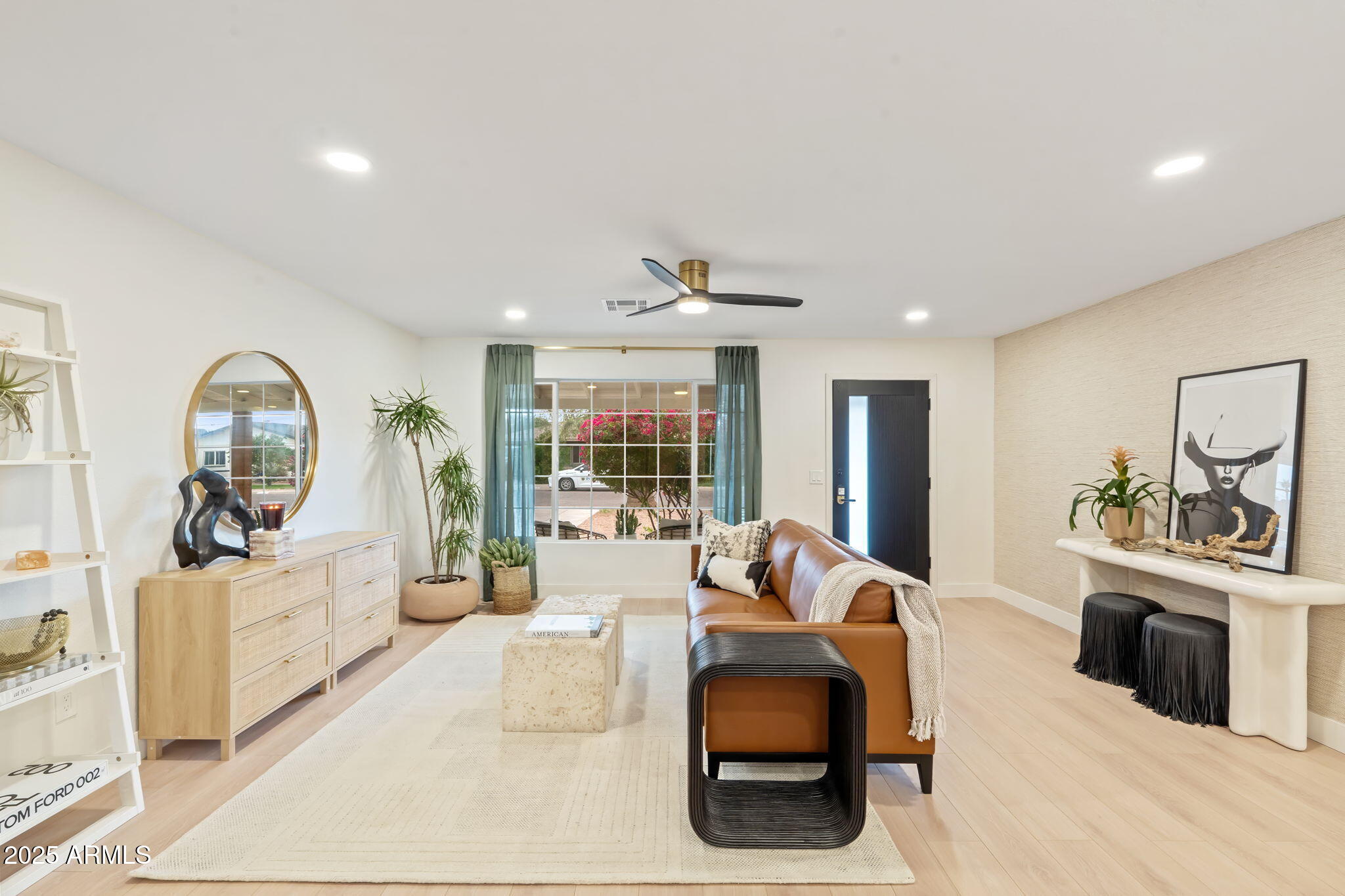7255 East Coronado Road Scottsdale, AZ 85257 - Photo 8 of 55 a living room with furniture and a flat screen tv
