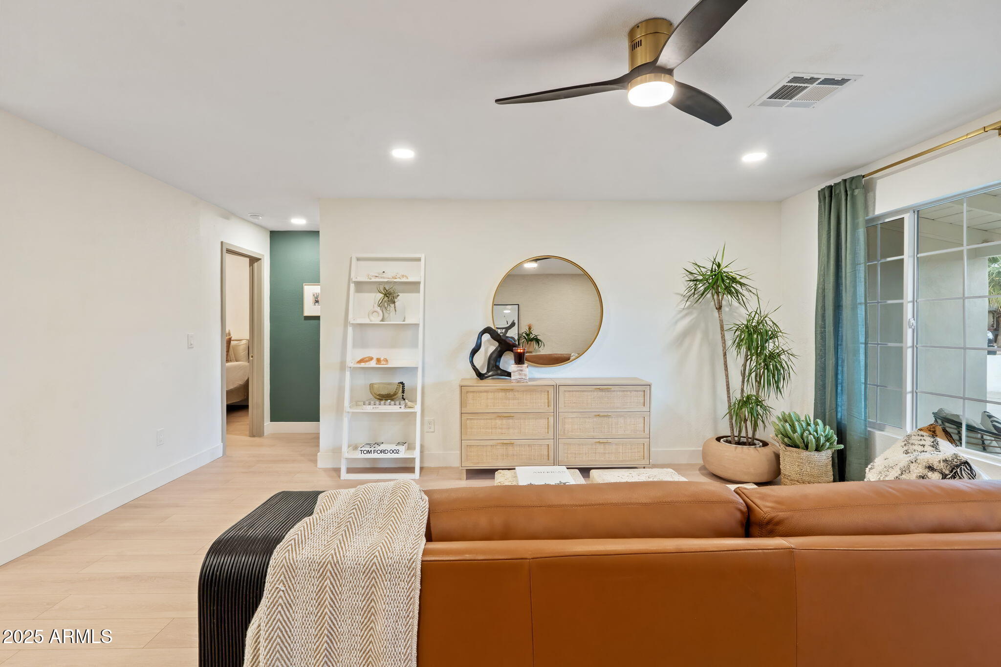 7255 East Coronado Road Scottsdale, AZ 85257 - Photo 9 of 55 a bed room with a bed and potted plant