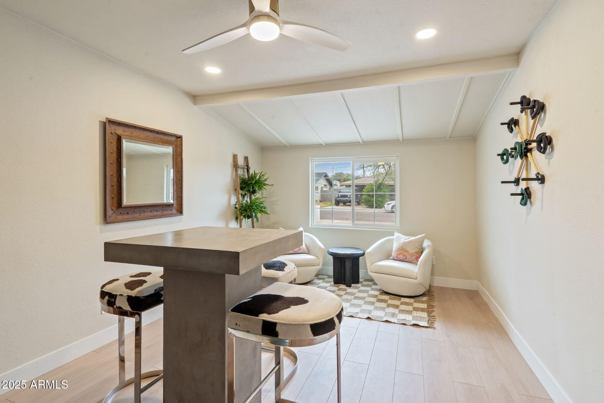 7255 East Coronado Road Scottsdale, AZ 85257 - Photo 18 of 55 a view of a workspace with furniture and window
