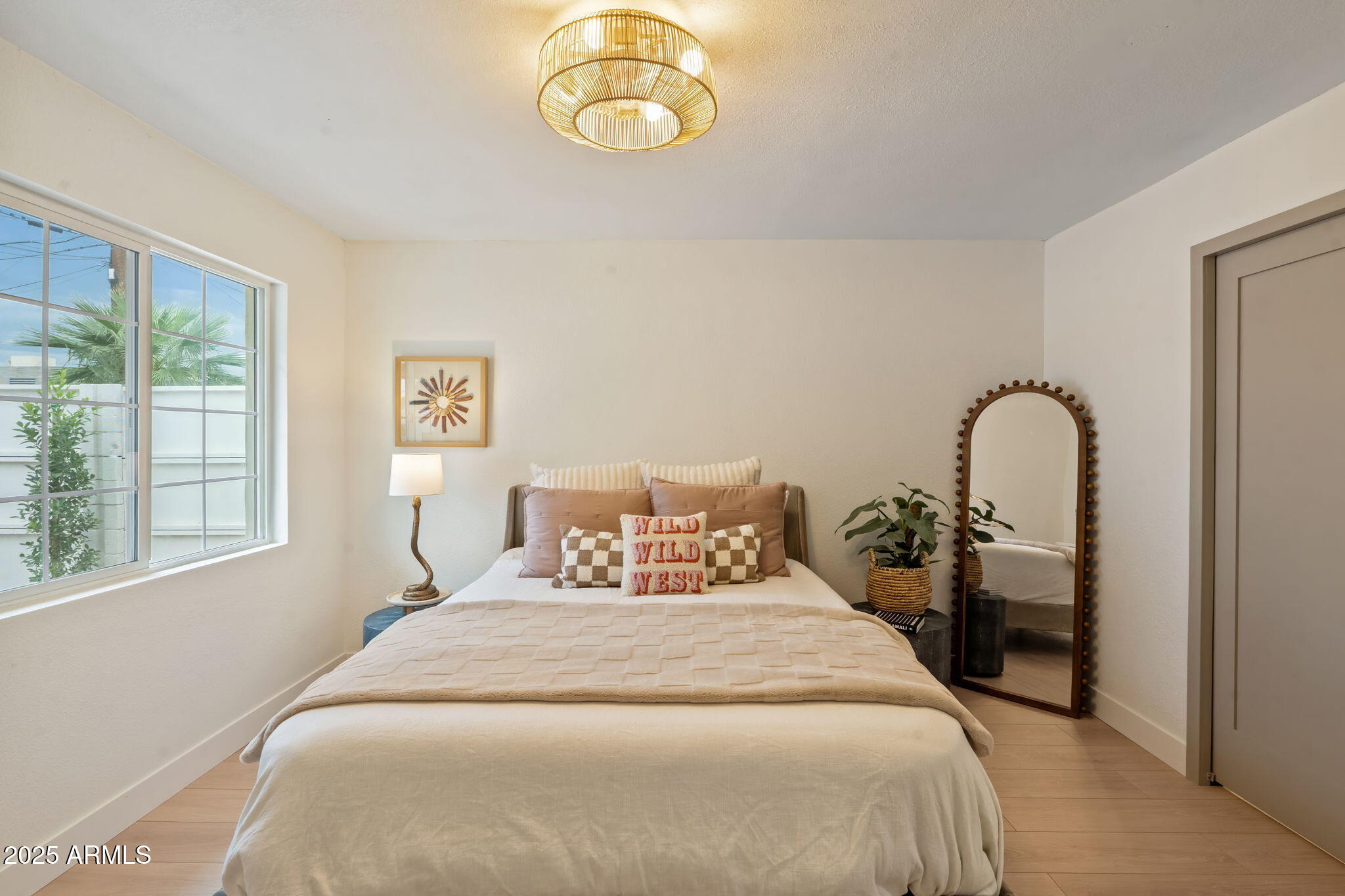 7255 East Coronado Road Scottsdale, AZ 85257 - Photo 22 of 55 a bedroom with a bed and a window