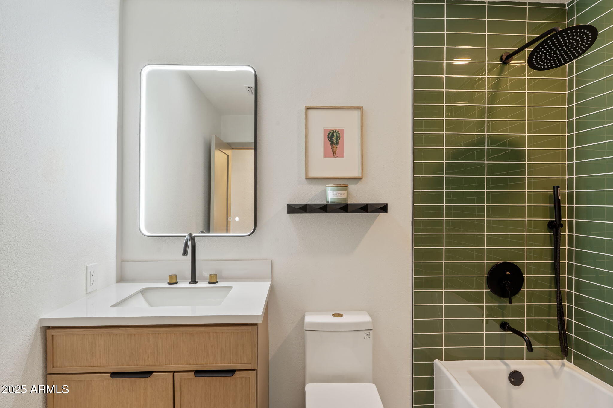 7255 East Coronado Road Scottsdale, AZ 85257 - Photo 27 of 55 a bathroom with a sink toilet and mirror
