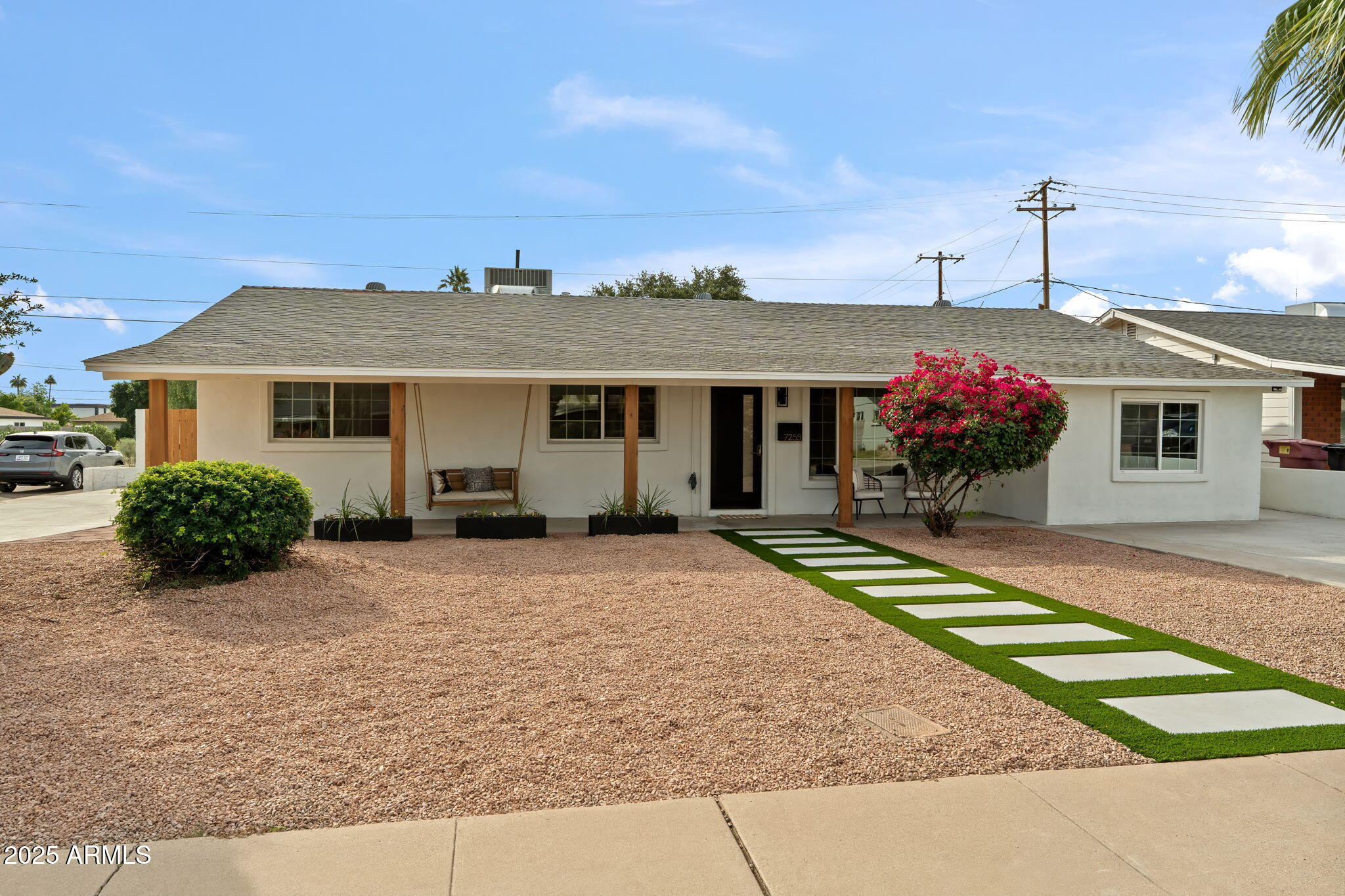 7255 East Coronado Road Scottsdale, AZ 85257 - Photo 2 of 55 a front view of a house with a yard