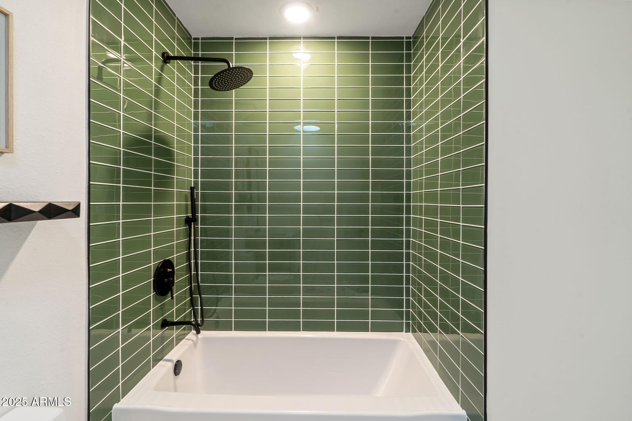 7255 East Coronado Road Scottsdale, AZ 85257 - Photo 29 of 55 a bathroom with a bathtub and a shower