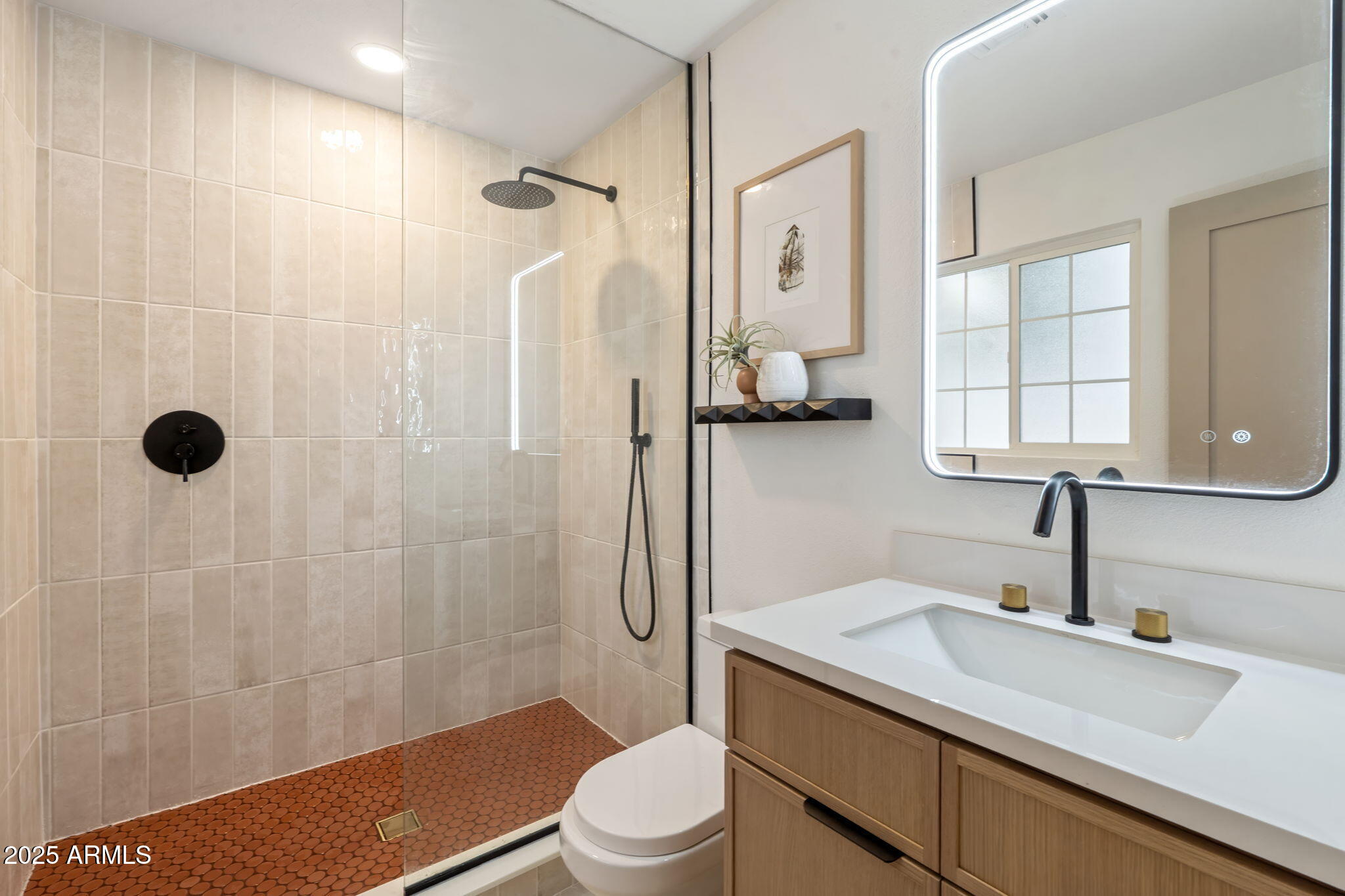 7255 East Coronado Road Scottsdale, AZ 85257 - Photo 34 of 55 a bathroom with a sink a toilet and shower