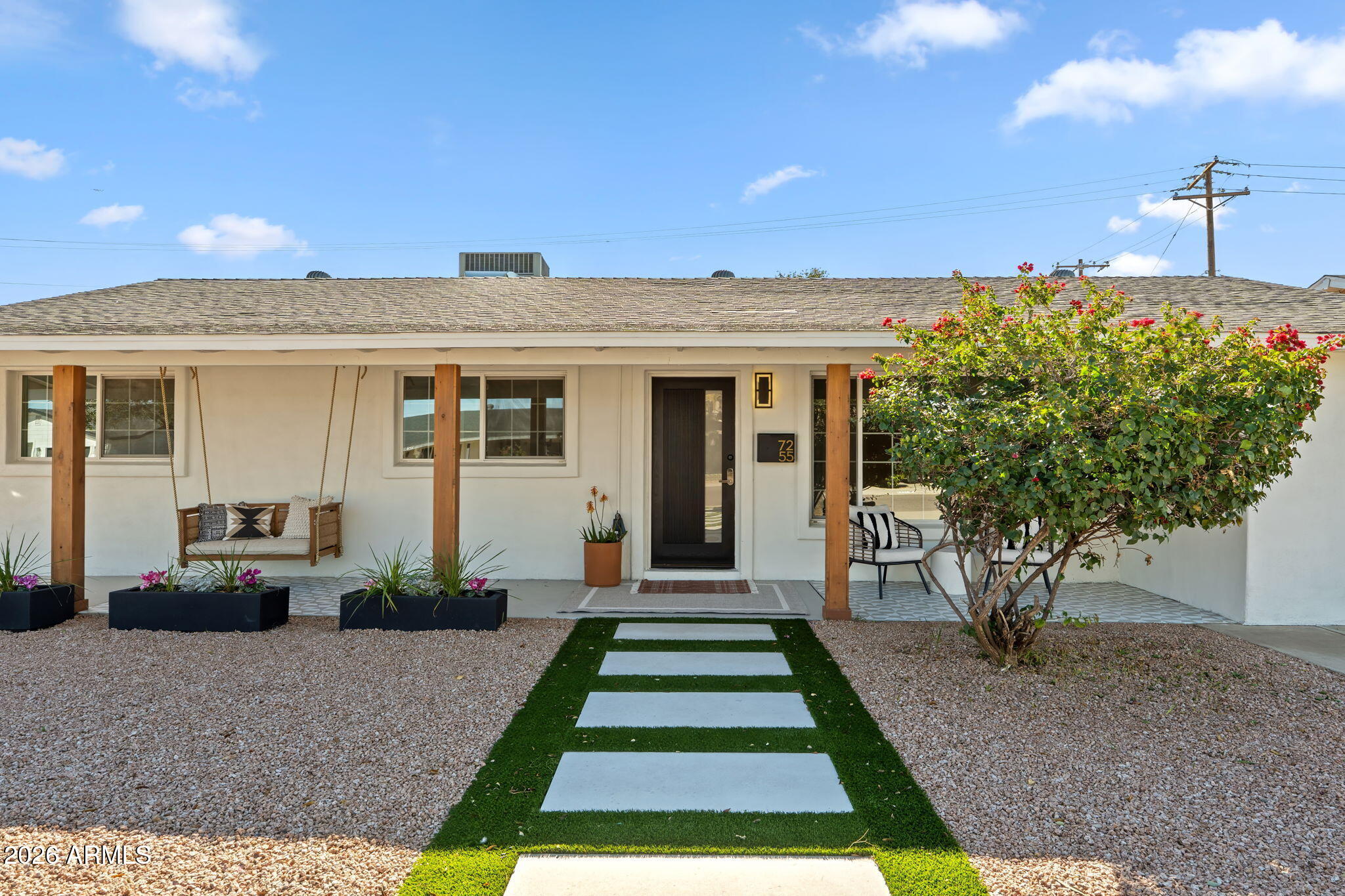 7255 East Coronado Road Scottsdale, AZ 85257 - Photo 3 of 55 a front view of a house with a yard