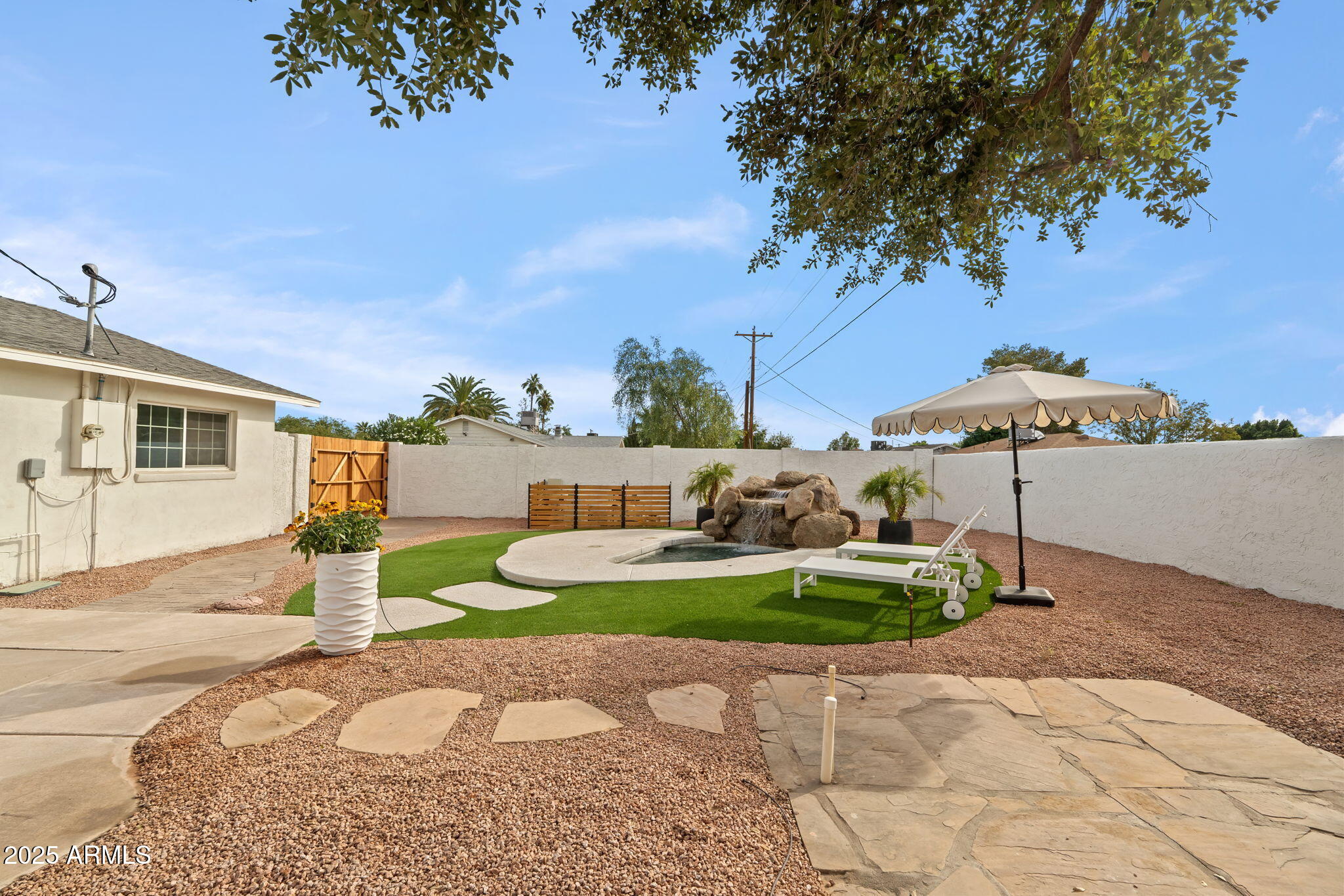 7255 East Coronado Road Scottsdale, AZ 85257 - Photo 38 of 55 a house view with a backyard space