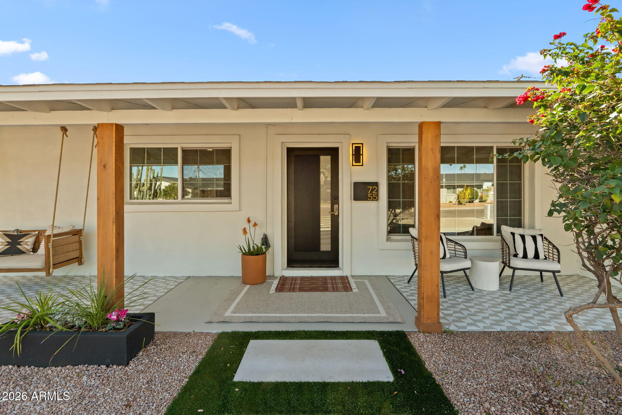 7255 East Coronado Road Scottsdale, AZ 85257 - Photo 4 of 55 a front view of a house with a porch