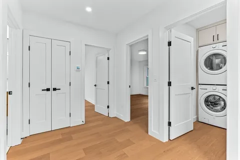 a view of a storage & utility room with washer and dryer