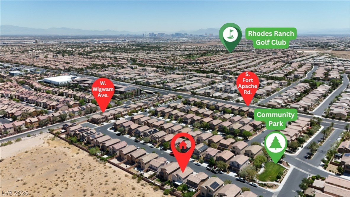 891 Earth Luster Road Las Vegas, NV 89178 - Photo 45 of 48 An aerial perspective reveals a well-developed neighborhood near a community park and golf club.